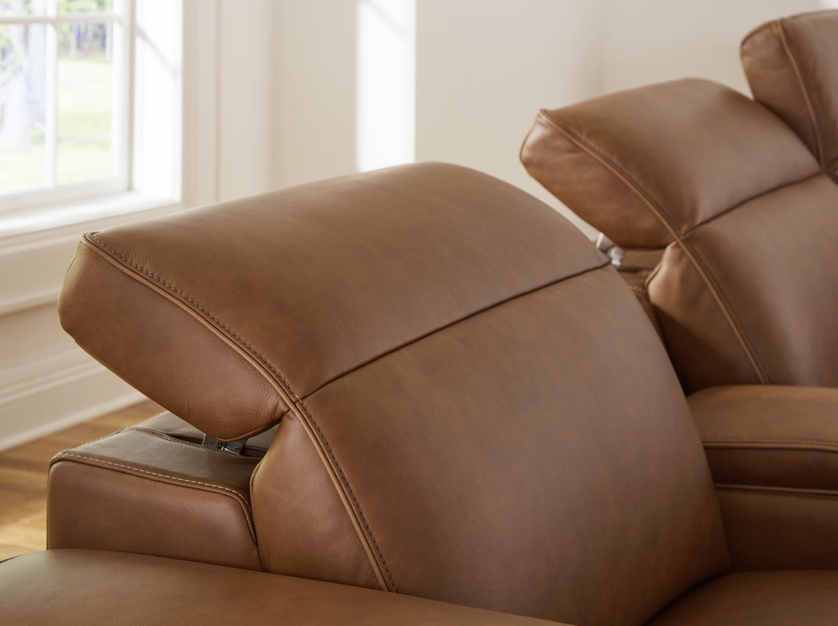 Magic Man Caramel 6-Piece Power Reclining Sectional with Console from Ashley Furniture - Luna Furniture