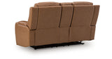 Knightington Caramel Power Reclining Loveseat with Audio Seating from Ashley Furniture - Luna Furniture
