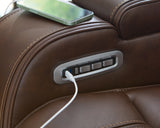 Knightington Brown Power Reclining Loveseat with Audio Seating from Ashley Furniture - Luna Furniture