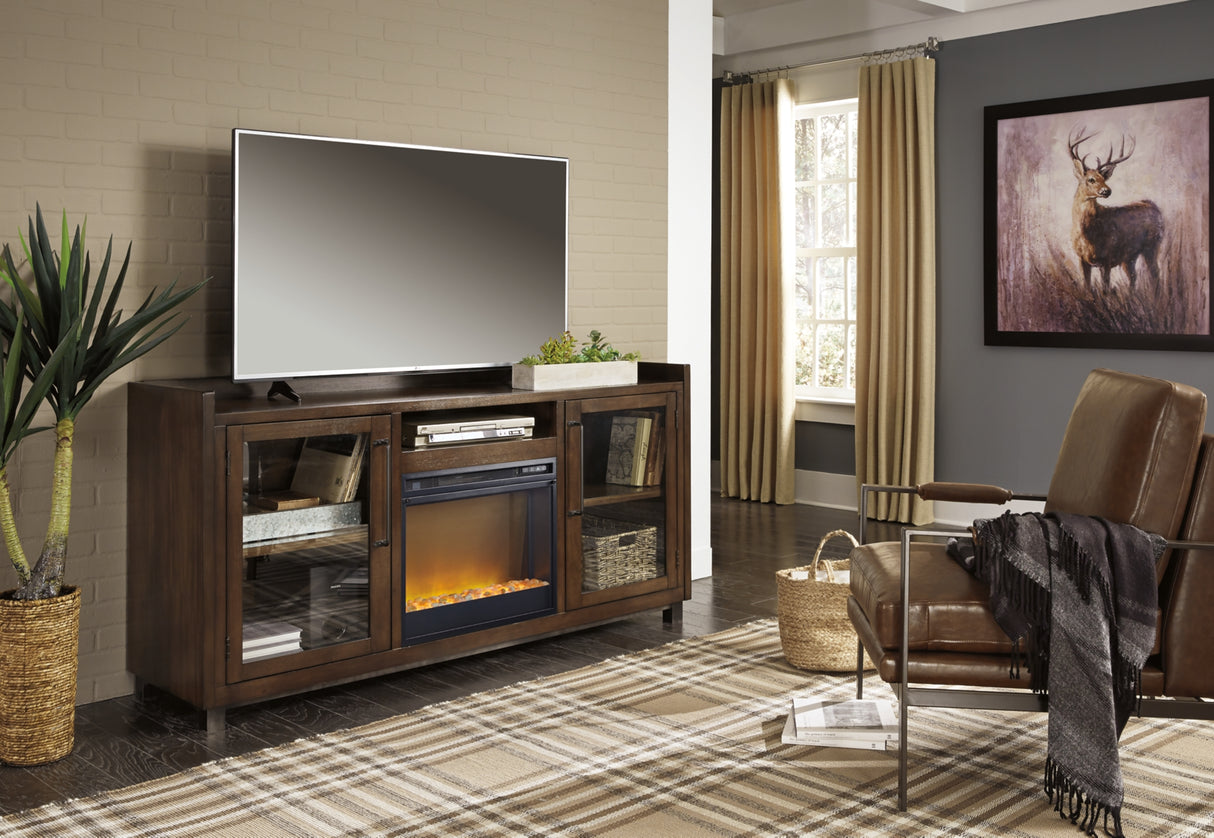 Starmore Brown 70" TV Stand with Electric Fireplace from Ashley Furniture - Luna Furniture