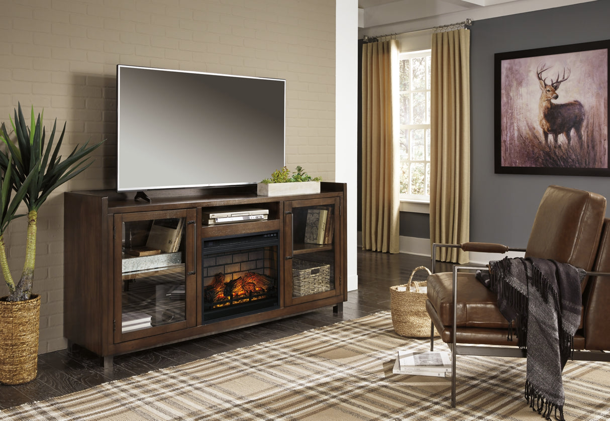 Starmore Brown 70" TV Stand with Electric Fireplace from Ashley Furniture - Luna Furniture