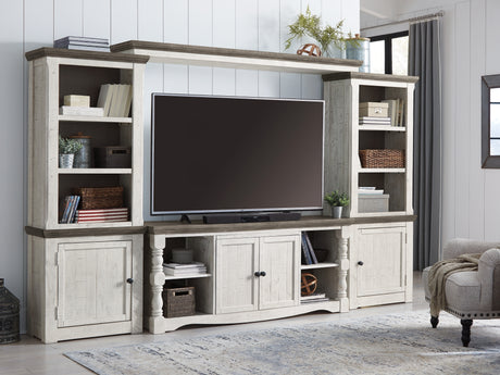 Havalance Two-tone 4-Piece Entertainment Center from Ashley - Luna Furniture