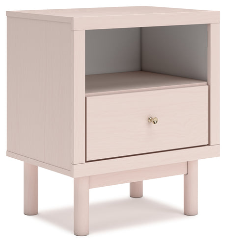 Wistenpine Full Upholstered Panel Headboard with Mirrored Dresser, Chest and Nightstand in Blush from Ashley - Luna Furniture