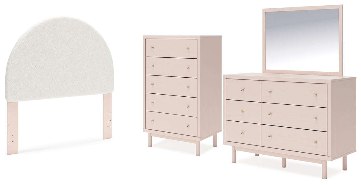 Wistenpine Full Upholstered Panel Headboard with Mirrored Dresser and Chest in Blush from Ashley - Luna Furniture