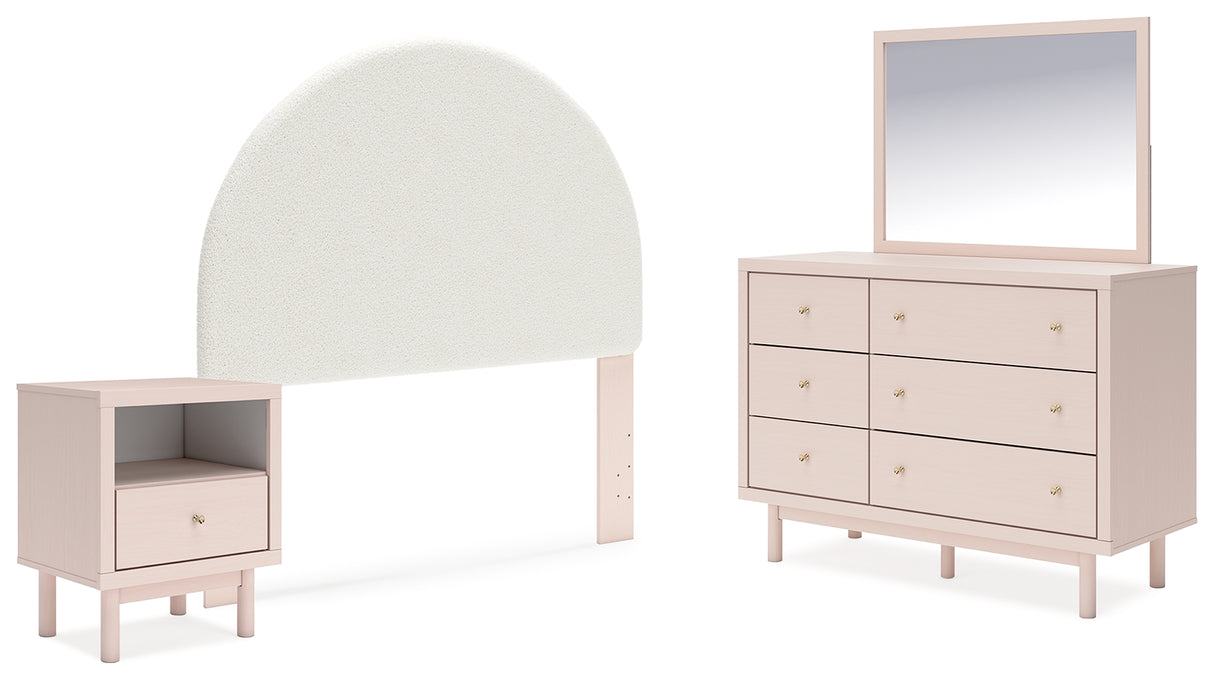 Wistenpine Full Upholstered Panel Headboard with Mirrored Dresser and Nightstand in Blush from Ashley - Luna Furniture