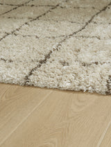 Wrenlow Cream/Brown Medium Rug from Ashley - Luna Furniture