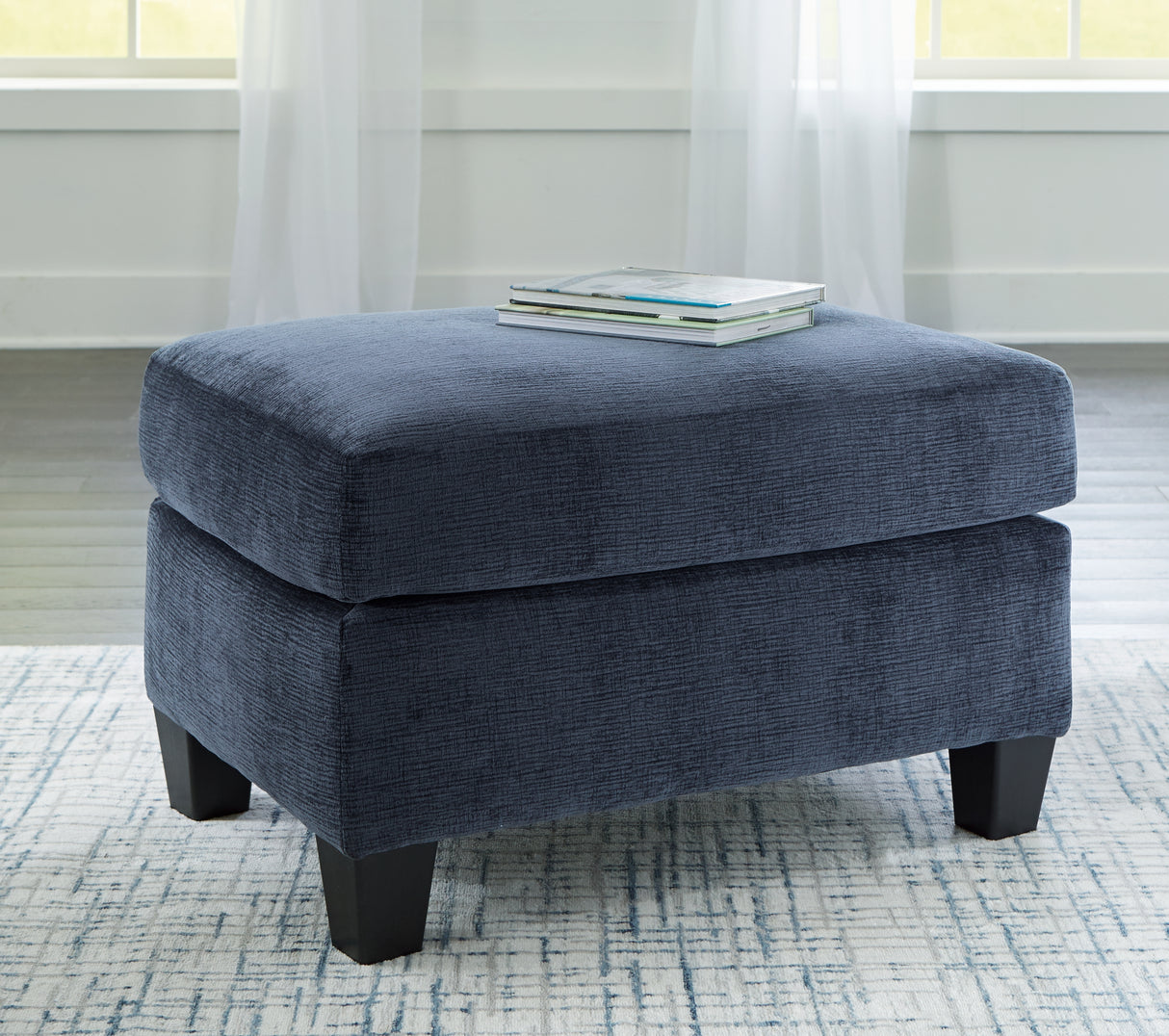 Amity Bay Ink Ottoman from Ashley - Luna Furniture