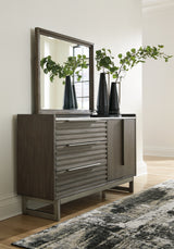 Arkenton Queen Panel Bed with Mirrored Dresser and Chest in Grayish Brown from Ashley - Luna Furniture