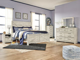 Bellaby King Crossbuck Panel Bed with Mirrored Dresser, Chest and 2 Nightstands in Whitewash from Ashley - Luna Furniture