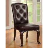 Bellagio Brown dining chair, tufted dark upholstery and carved wood legs, front view