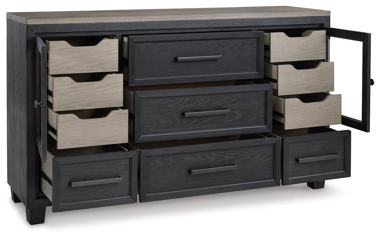 Foyland California King Panel Storage Bed with Dresser in Black/Brown from Ashley - Luna Furniture