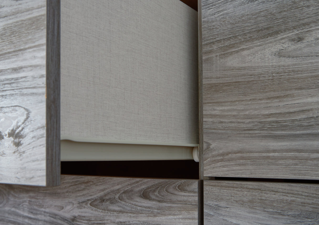 Bronyan King Panel Bed with Mirrored Dresser, Chest and 2 Nightstands in Dark Gray from Ashley - Luna Furniture