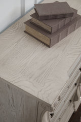 Bruchandi King Upholstered Panel Bed with Dresser and Chest in Antique White from Ashley Furniture - Luna Furniture