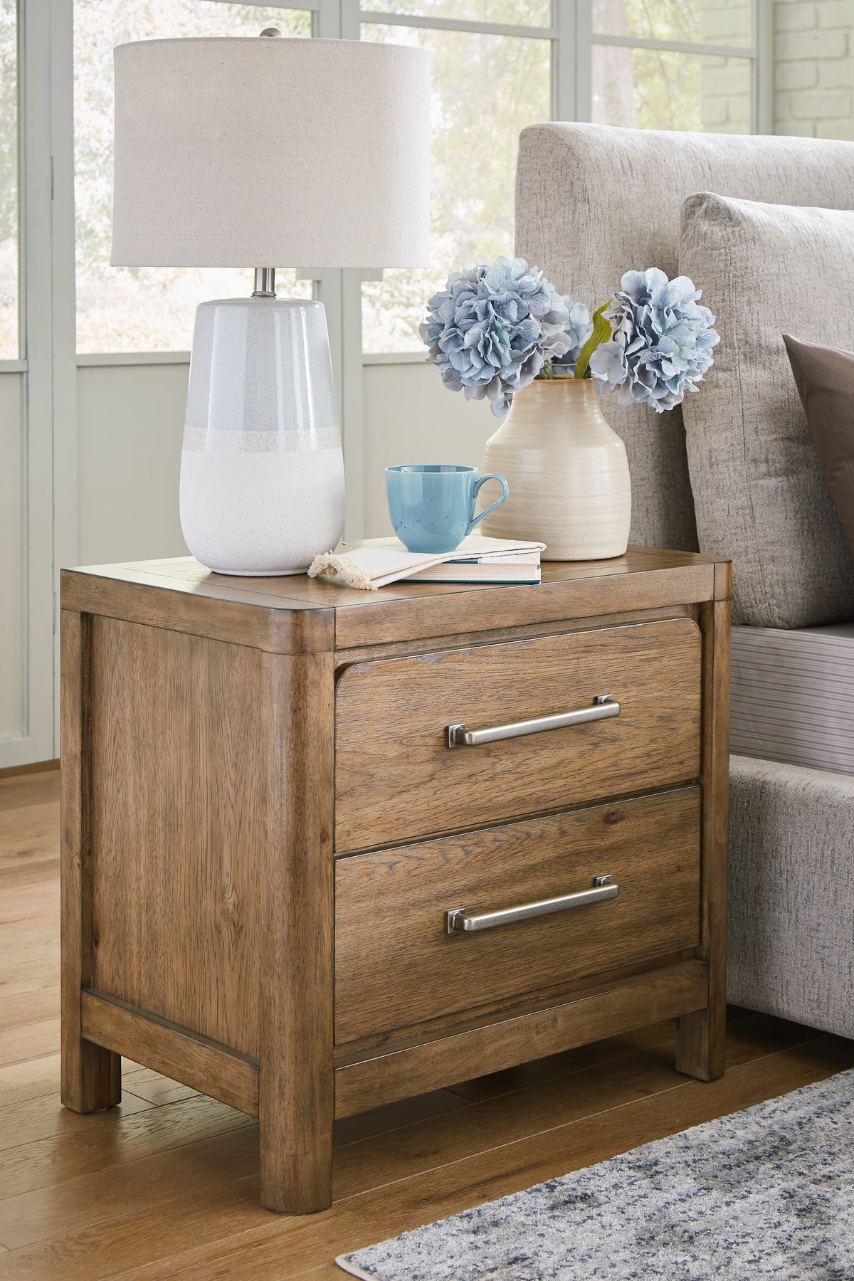 Cabalynn Queen Panel Bed with Storage with Mirrored Dresser and Nightstand in Light Brown from Ashley Furniture - Luna Furniture