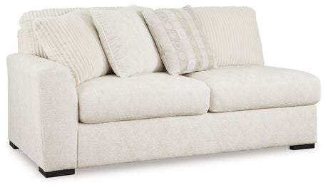 Chessington Ivory 4-Piece Sectional with Ottoman in Ivory from Ashley - Luna Furniture