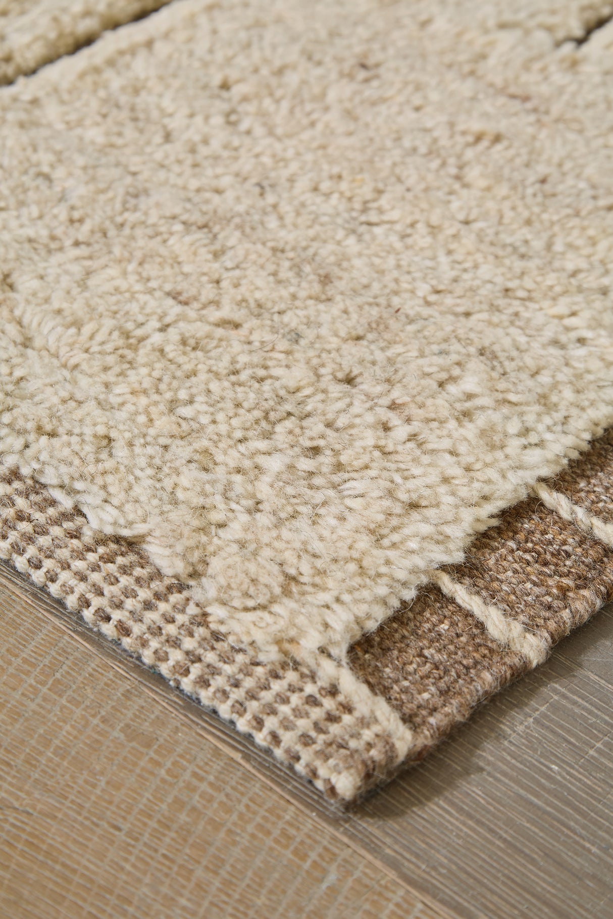 Clayman Beige/Brown Large Rug from Ashley Furniture - Luna Furniture