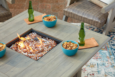 Cliff Trails Beige Fire Pit Table from Ashley - Luna Furniture