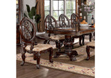 Normandy Brown Cherry dining table set, carved chairs and double pedestal table, three-quarter view