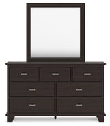 Covetown King Panel Bed with Mirrored Dresser, Chest and Nightstand in Dark Brown from Ashley - Luna Furniture