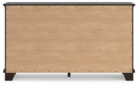 Covetown Queen Panel Bed with Dresser in Dark Brown from Ashley - Luna Furniture