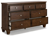 Danabrin California King Panel Storage Bed with Dresser and Chest in Brown from Ashley - Luna Furniture