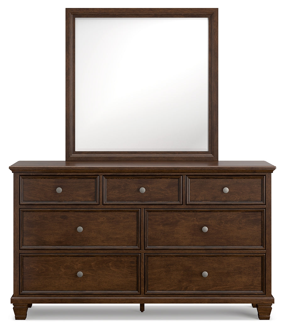 Danabrin King Panel Bed with Mirrored Dresser and Chest in Brown from Ashley - Luna Furniture