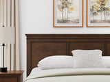 Danabrin King Panel Storage Bed with Mirrored Dresser and Nightstand in Brown from Ashley - Luna Furniture