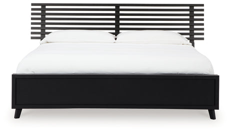 Danziar Queen Panel Bed with Mirrored Dresser and Chest in Black from Ashley - Luna Furniture