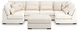 Donelson Creek 4-Piece Sectional and Ottoman from Ashley - Luna Furniture