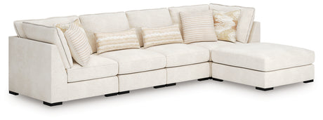 Donelson Creek Vanilla 4-Piece Modular Sectional and Ottoman from Ashley - Luna Furniture