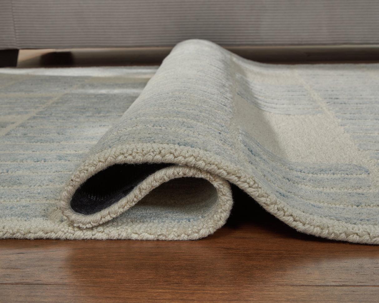 Dylanton Ivory/Blue Large Rug from Ashley Furniture - Luna Furniture