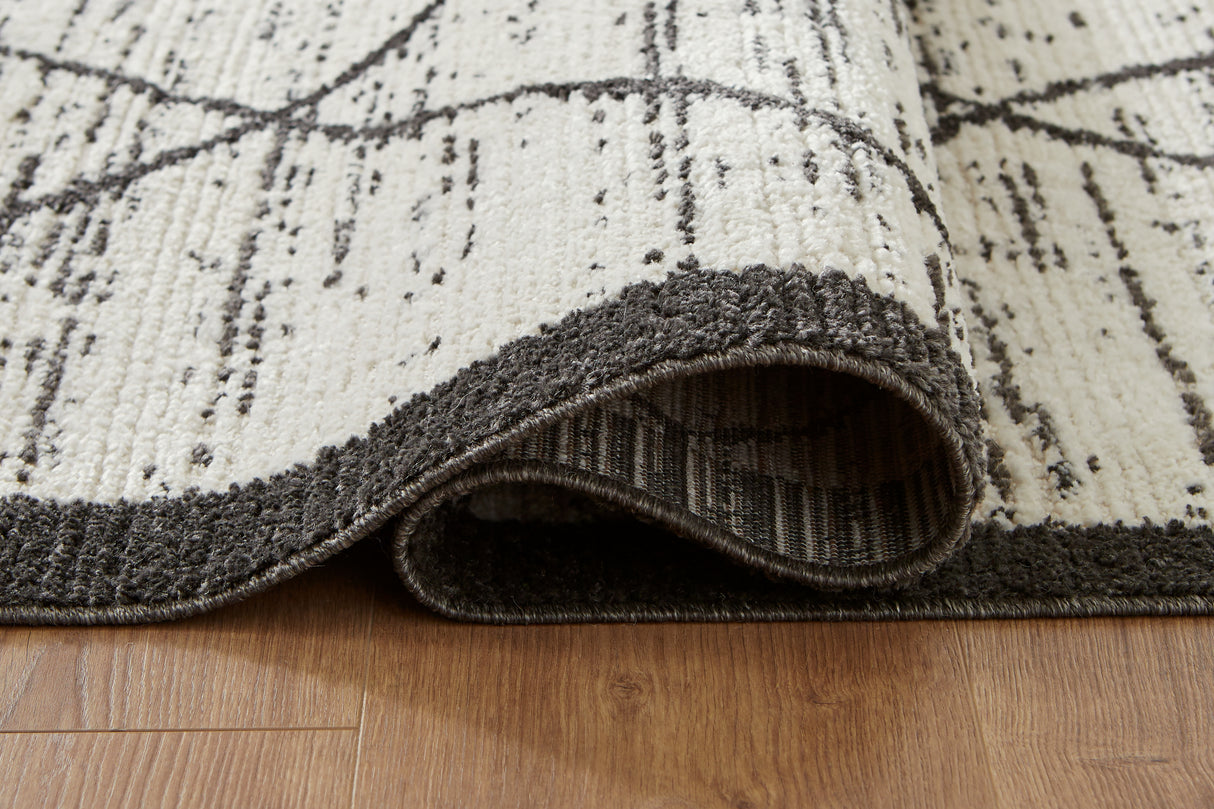 Fenriston Cream/Black Large Rug from Ashley - Luna Furniture