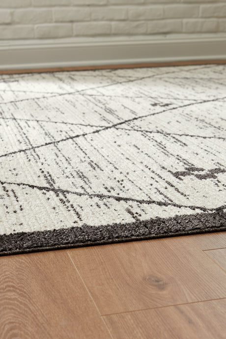 Fenriston Cream/Black Medium Rug from Ashley - Luna Furniture