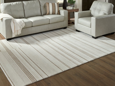Gadence Ivory/Tan Large Rug from Ashley - Luna Furniture