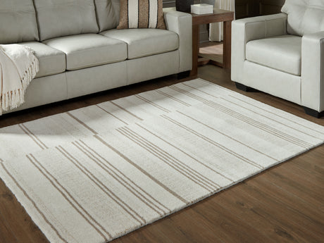 Gadence Ivory/Tan Medium Rug from Ashley - Luna Furniture