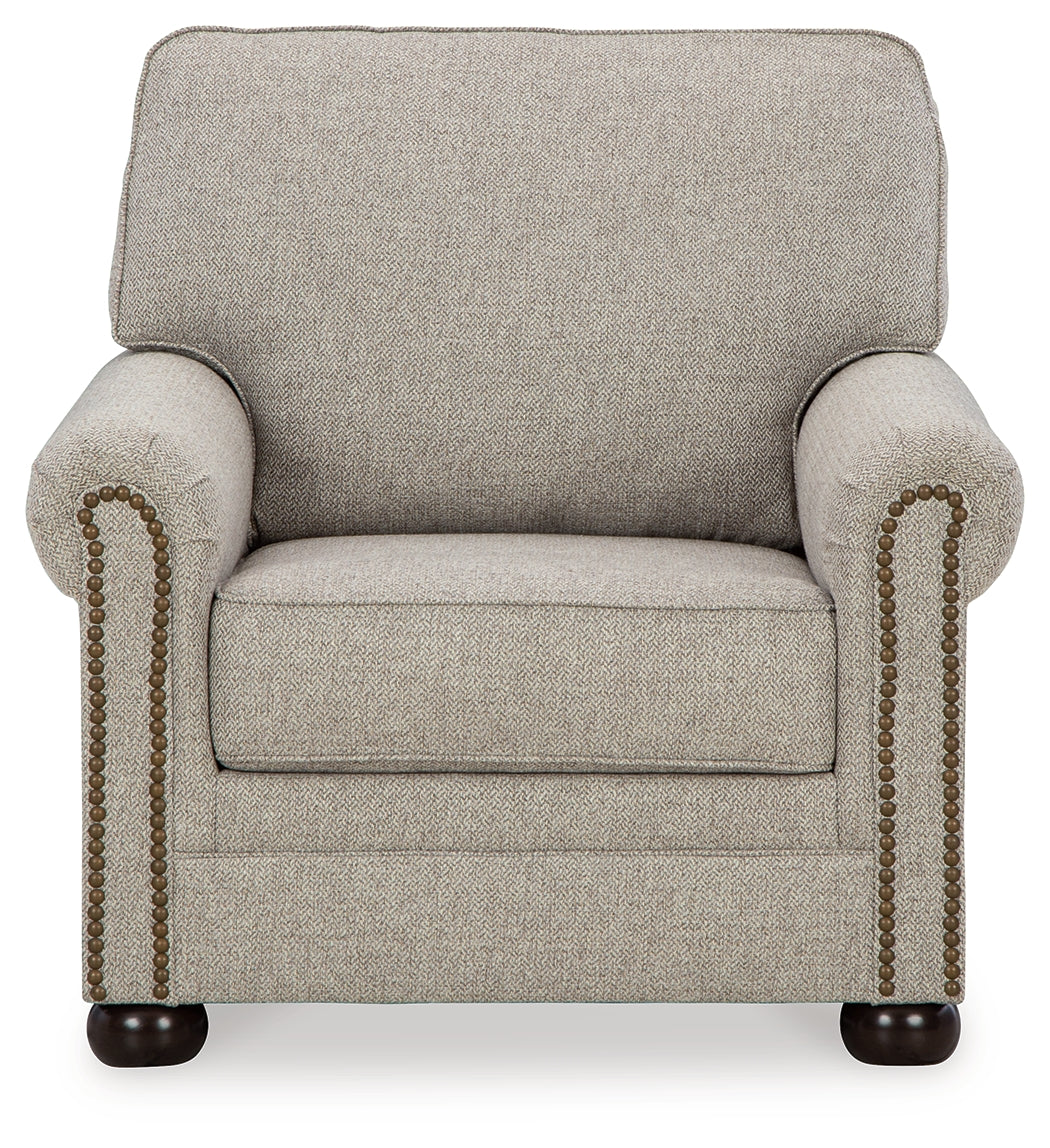 Gaelon Chair and Ottoman in Dune from Ashley Furniture - Luna Furniture