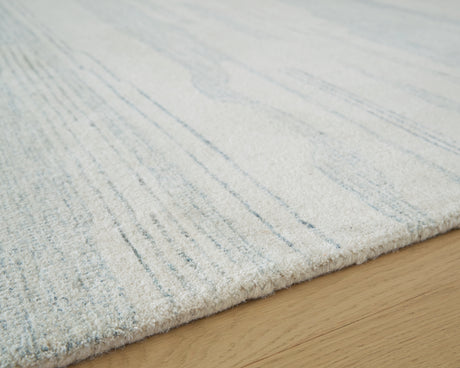 Genemost Ivory/Blue Medium Rug from Ashley Furniture - Luna Furniture