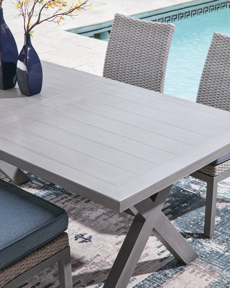 Half Moon Beach Outdoor Dining table with 2 Arm Chairs and 4 Side Chairs in Gray from Ashley Furniture - Luna Furniture