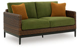 Horizon Hall Brown/Green Outdoor Loveseat with Cushion from Ashley - Luna Furniture