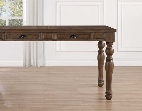 Joanna 59.5″ 4-Drawer Dining Table, Brown from Steve Silver - Luna Furniture