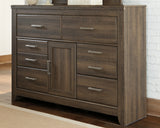 Juararo California King Poster Bed with Dresser in Dark Brown from Ashley - Luna Furniture