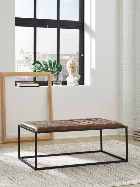 Junsor Brown/Black Coffee Table Ottoman from Ashley - Luna Furniture