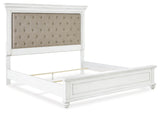 Kanwyn California King Panel Bed with Mirrored Dresser and Chest in Whitewash from Ashley - Luna Furniture