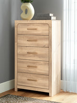 Kinlanni Queen Upholstered Platform Bed with Dresser and Chest in Tan from Ashley - Luna Furniture