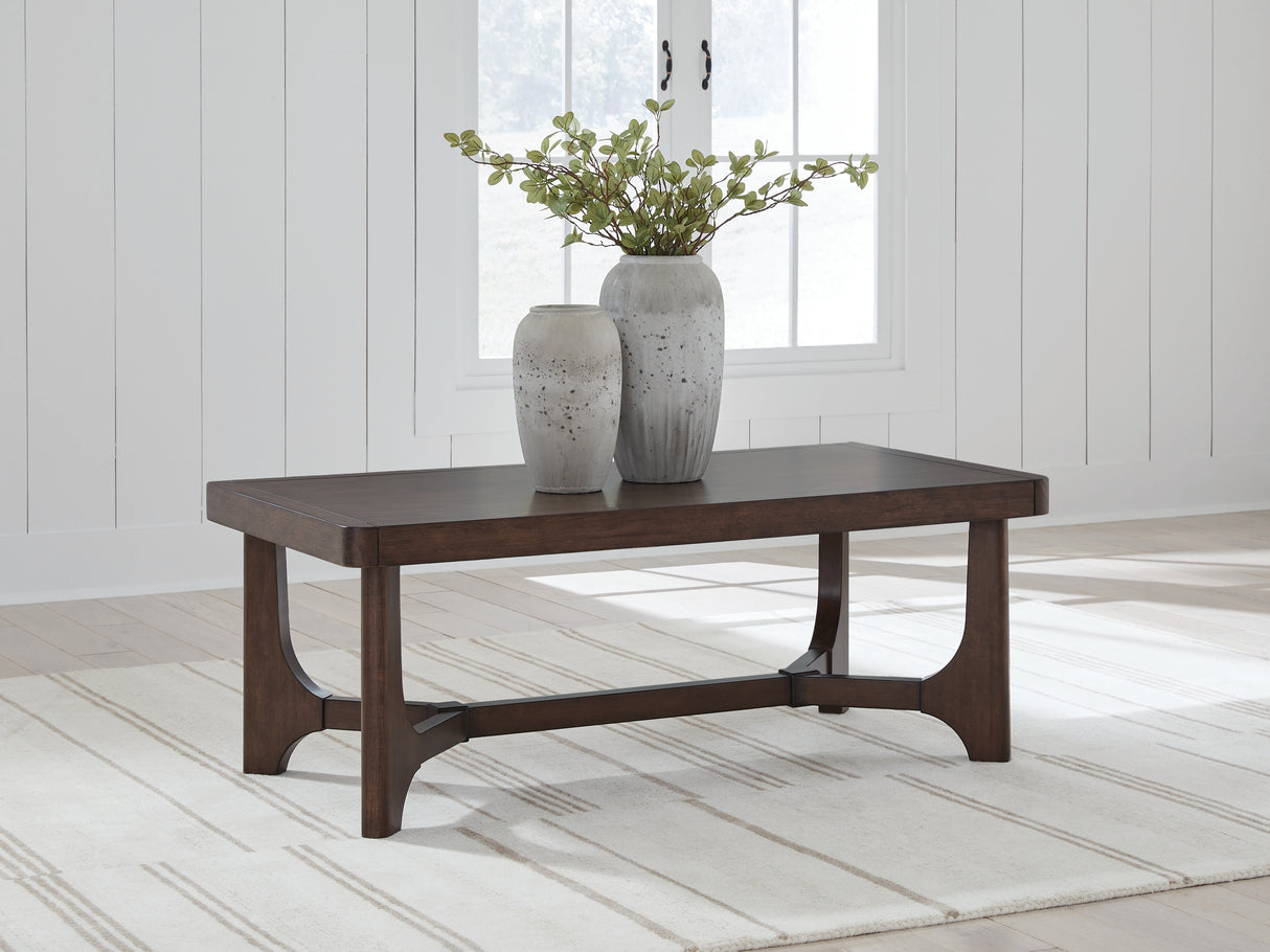 Korestone Dark Brown Coffee Table from Ashley - Luna Furniture