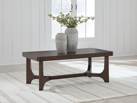 Korestone Dark Brown Coffee Table from Ashley - Luna Furniture