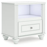 Kozlani Full Upholstered Panel Storage Bed with Dresser and Nightstand in White from Ashley - Luna Furniture