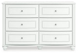 Kozlani Twin Upholstered Panel Bed with Dresser and Nightstand in White from Ashley - Luna Furniture
