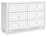 Kozlani Twin Upholstered Panel Storage Bed with Dresser and Chest in White from Ashley - Luna Furniture