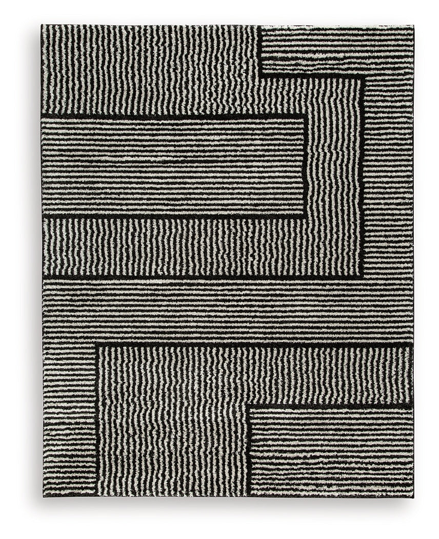 Kurtmen Black/Ivory Large Rug from Ashley Furniture - Luna Furniture